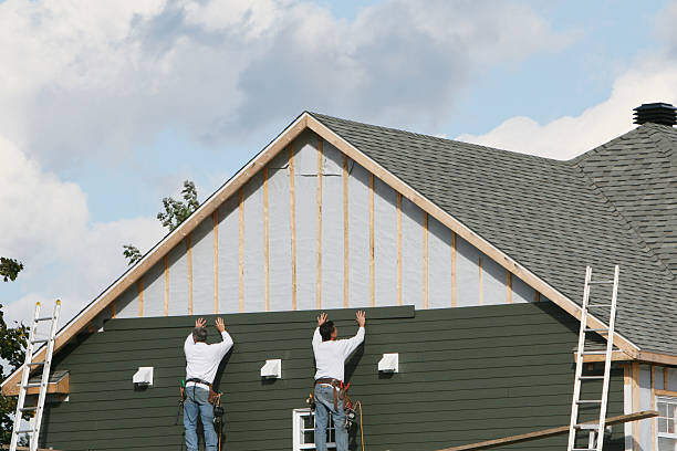 Professional Siding Contractor technician working in Whitakers, NC